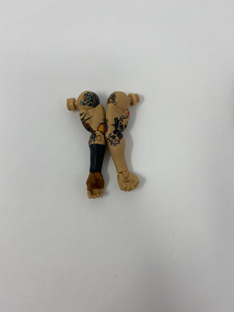 Arm (tattoos with black sleeve and brown hand tape)